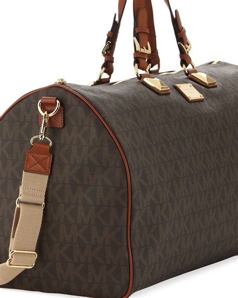 michael kors jet set travel gesteppt|Michael Kors jet set duffle.